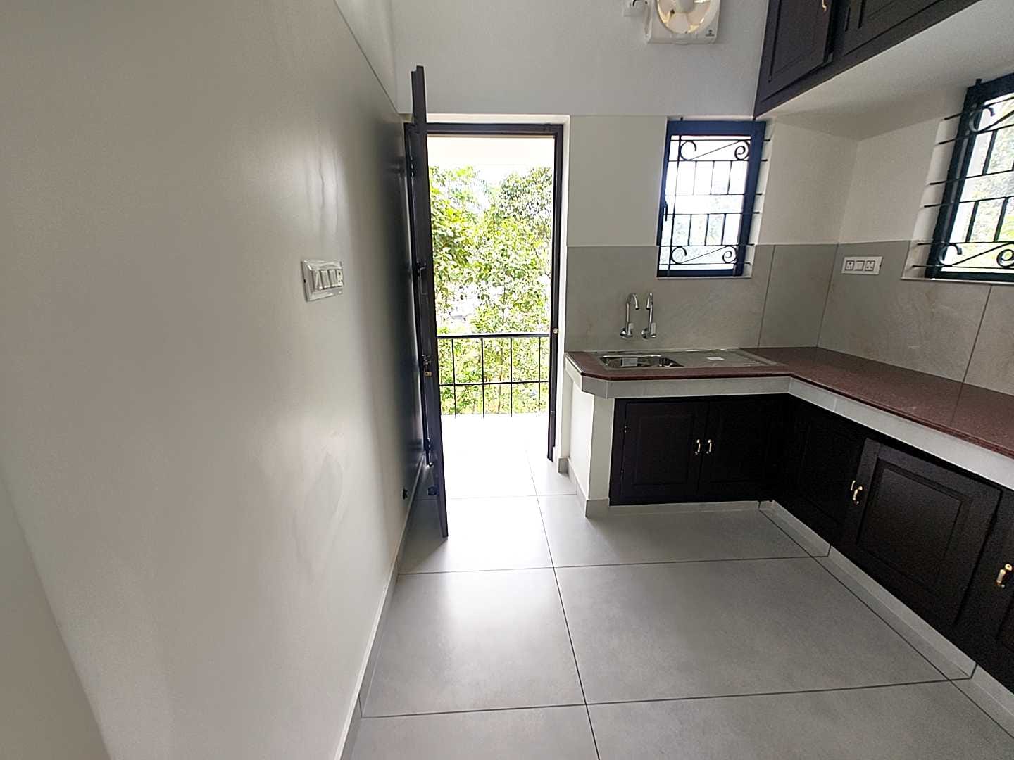 Kitchen with balcony access